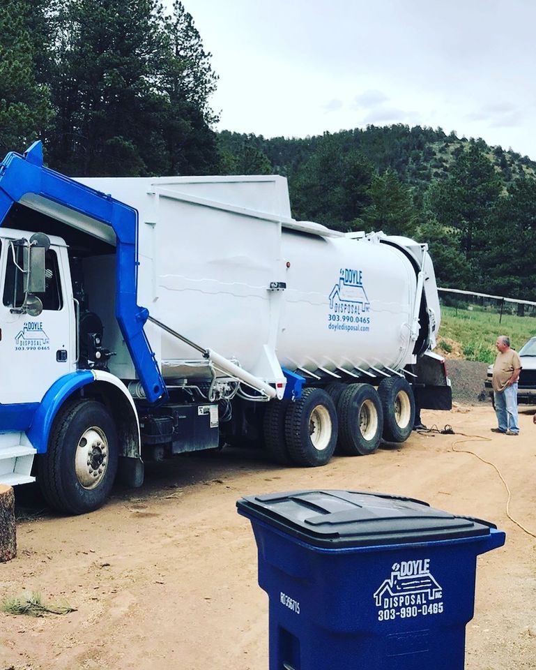 White Garbage Truck of Doyle Disposal — Dumont, CO — Doyle Disposal