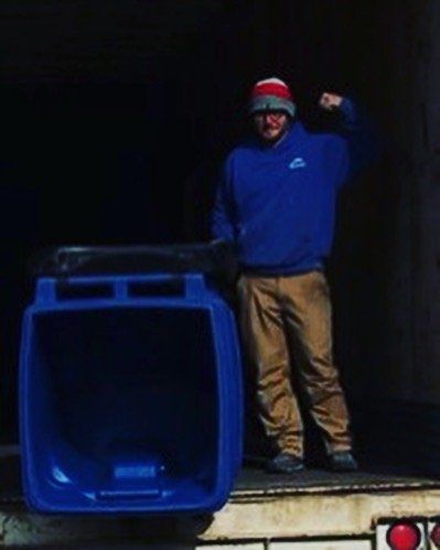 Collector Holding a Dumpster — Dumont, CO — Doyle Disposal