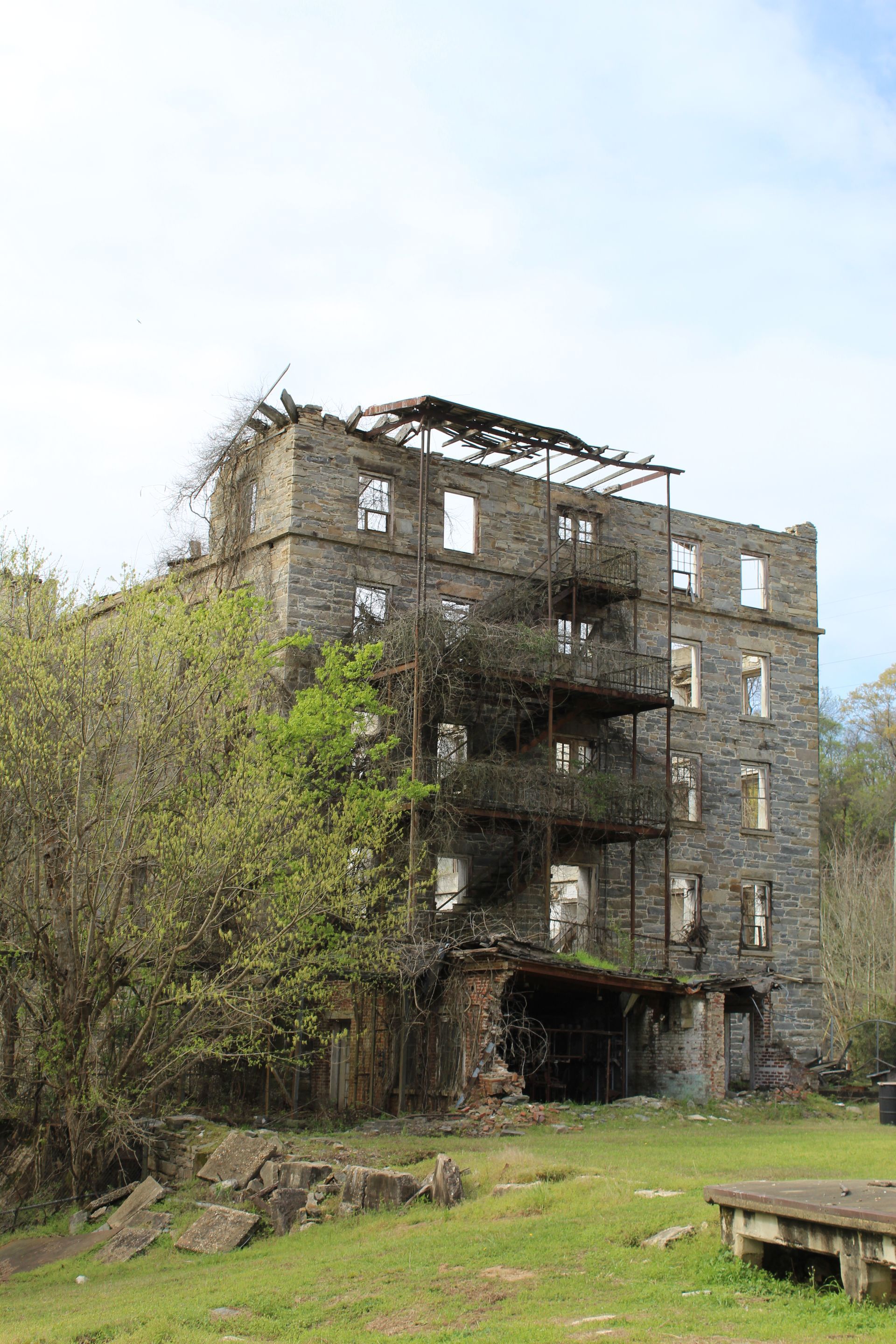 The Tallassee 1852 Mill towers above the nearby trees