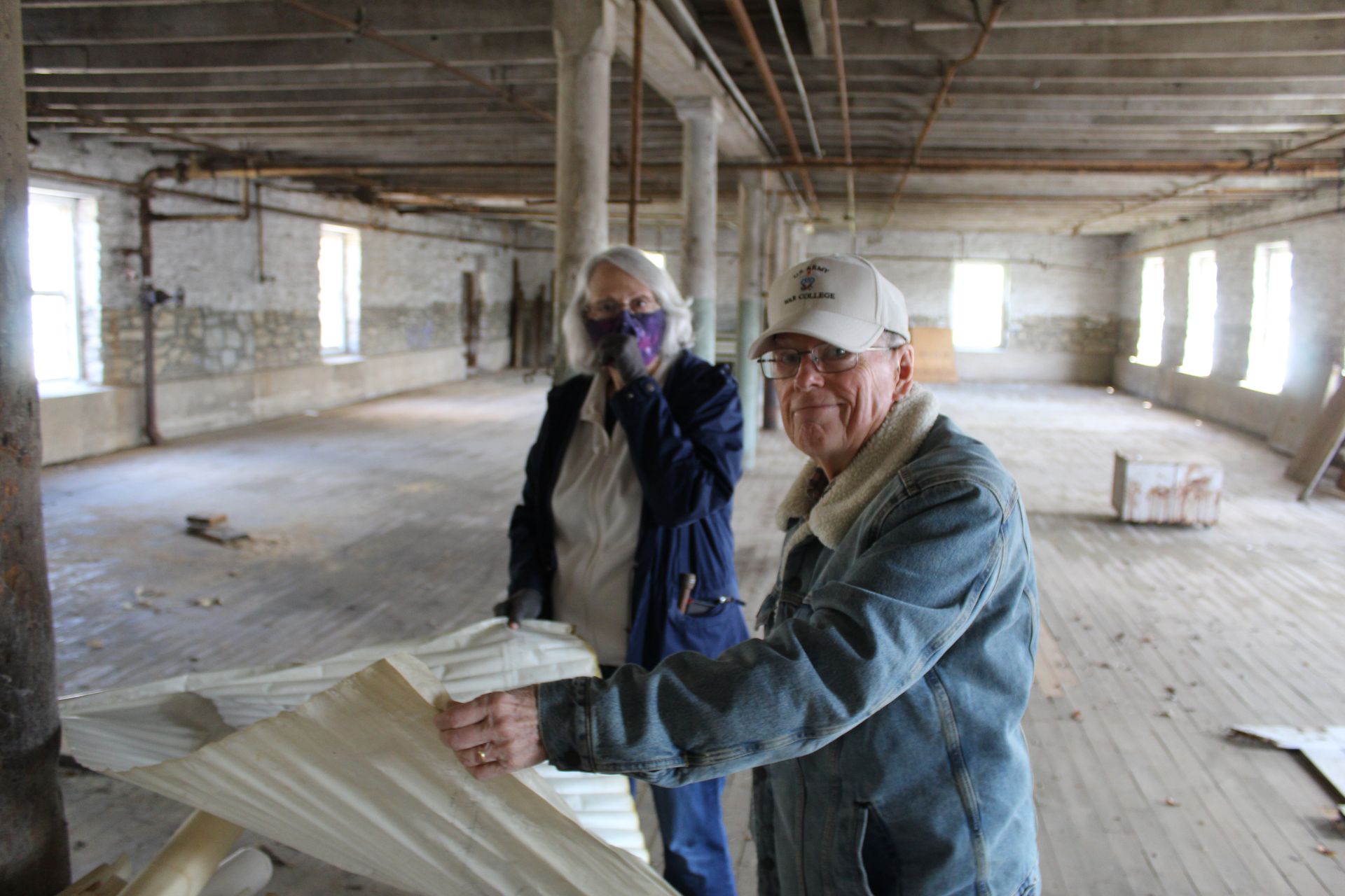 THPS officers Susan Dragone and Bob Reed review detailed drawings and maps.
