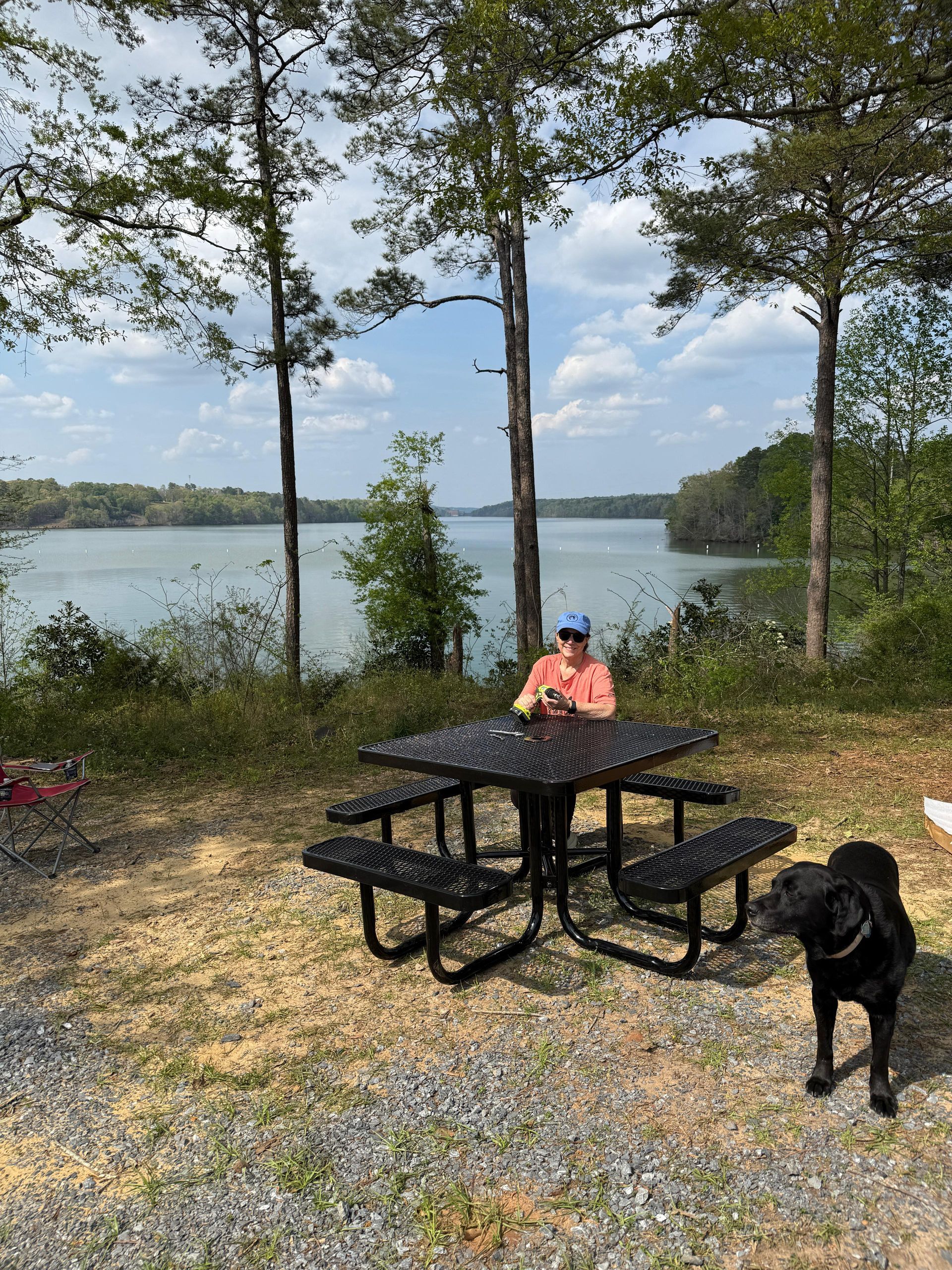 TRA members rest at new picnic tables with view of Lake Talisi
