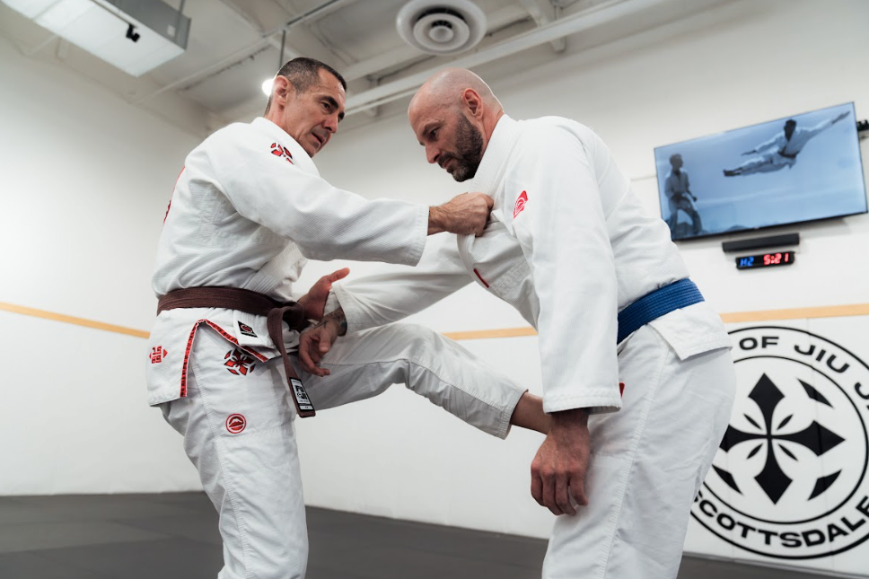Adults practicing focused self-defense drills at Academy of Jiu-Jitsu Scottsdale in Scottsdale, AZ.