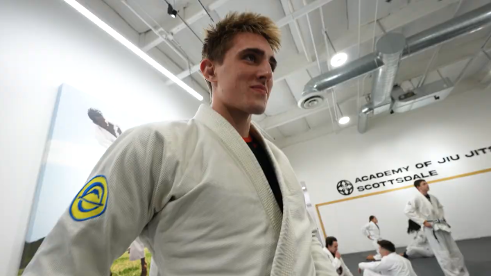 Beginner students drilling closed guard and escapes at Academy of Jiu-Jitsu Scottsdale.
