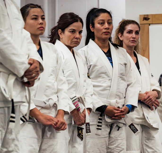Students drilling Jiu-Jitsu techniques at Academy of Jiu-Jitsu Scottsdale in Scottsdale, AZ for fitness and discipline.