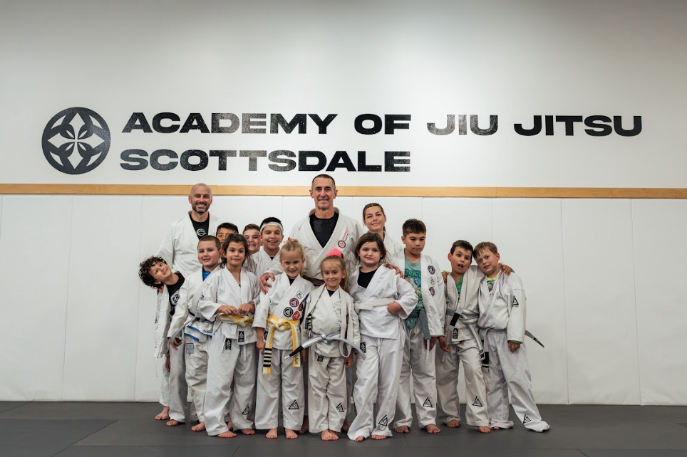 Kids and adults training Jiu-Jitsu at Academy of Jiu-Jitsu Scottsdale in Scottsdale, AZ.