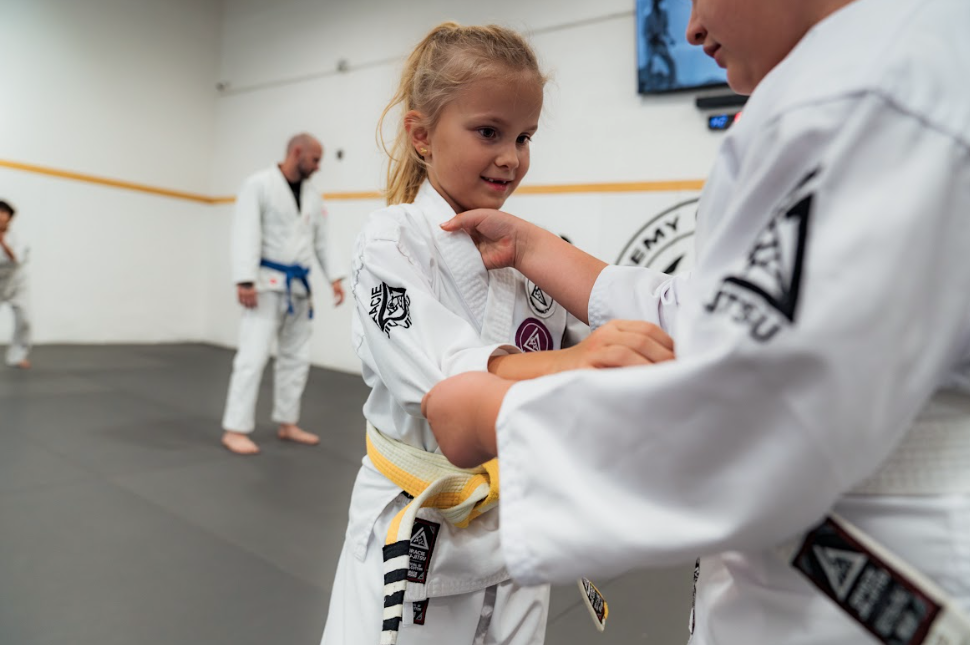 Family training together on the mats at Academy of Jiu-Jitsu Scottsdale in Scottsdale, AZ.