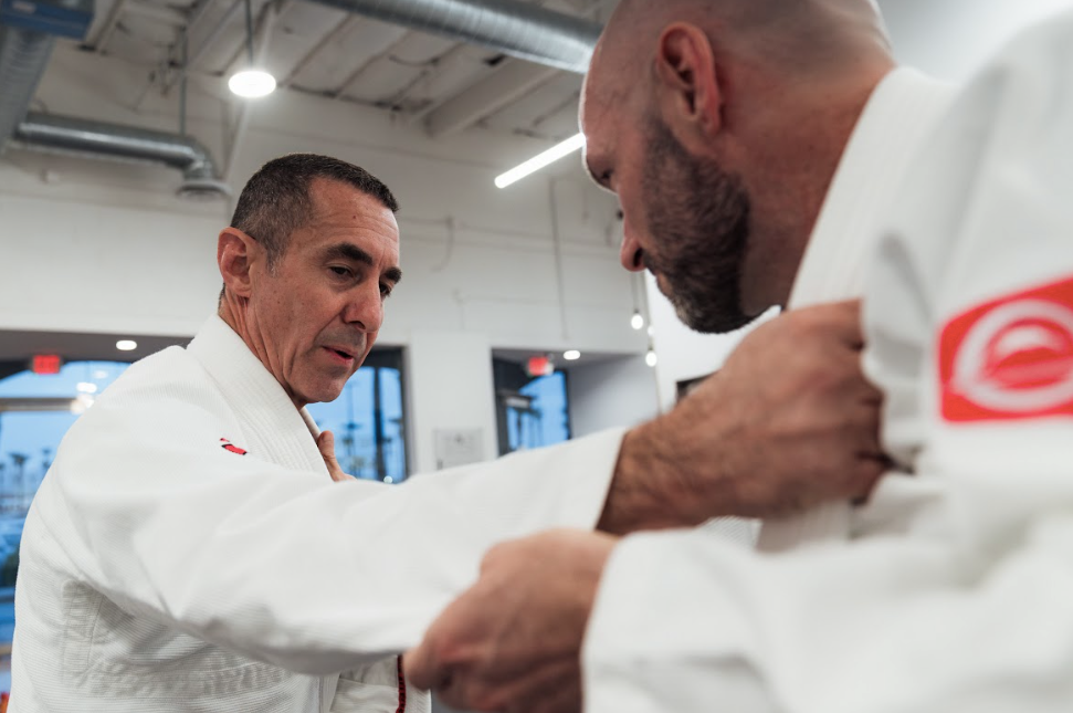 Students practice controlled Jiu-Jitsu grappling at Academy of Jiu-Jitsu Scottsdale in Scottsdale.