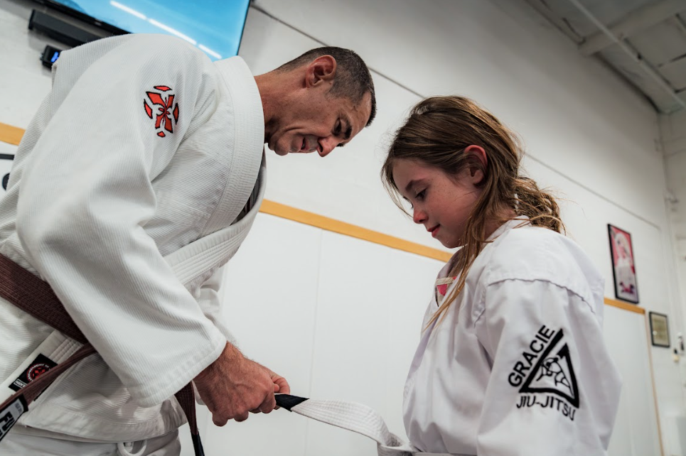 Kids practicing safe after-school karate drills at Academy of Jiu-Jitsu Scottsdale in Scottsdale, AZ