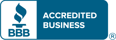 A blue sign that says accredited business on it
