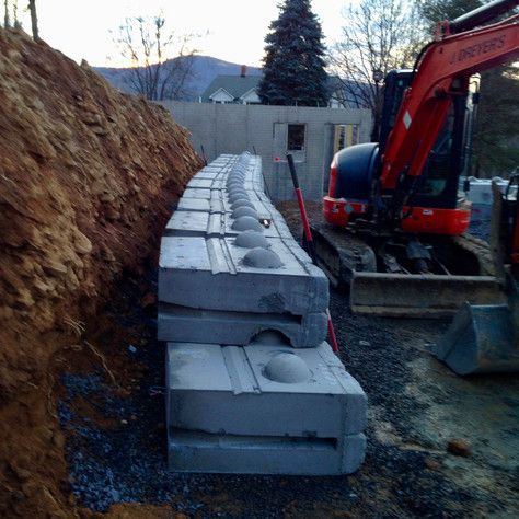 A row of concrete blocks are stacked on top of each other