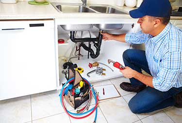 Plumber Repairing the Sink - Drain Cleaning in Fort Collins, CO