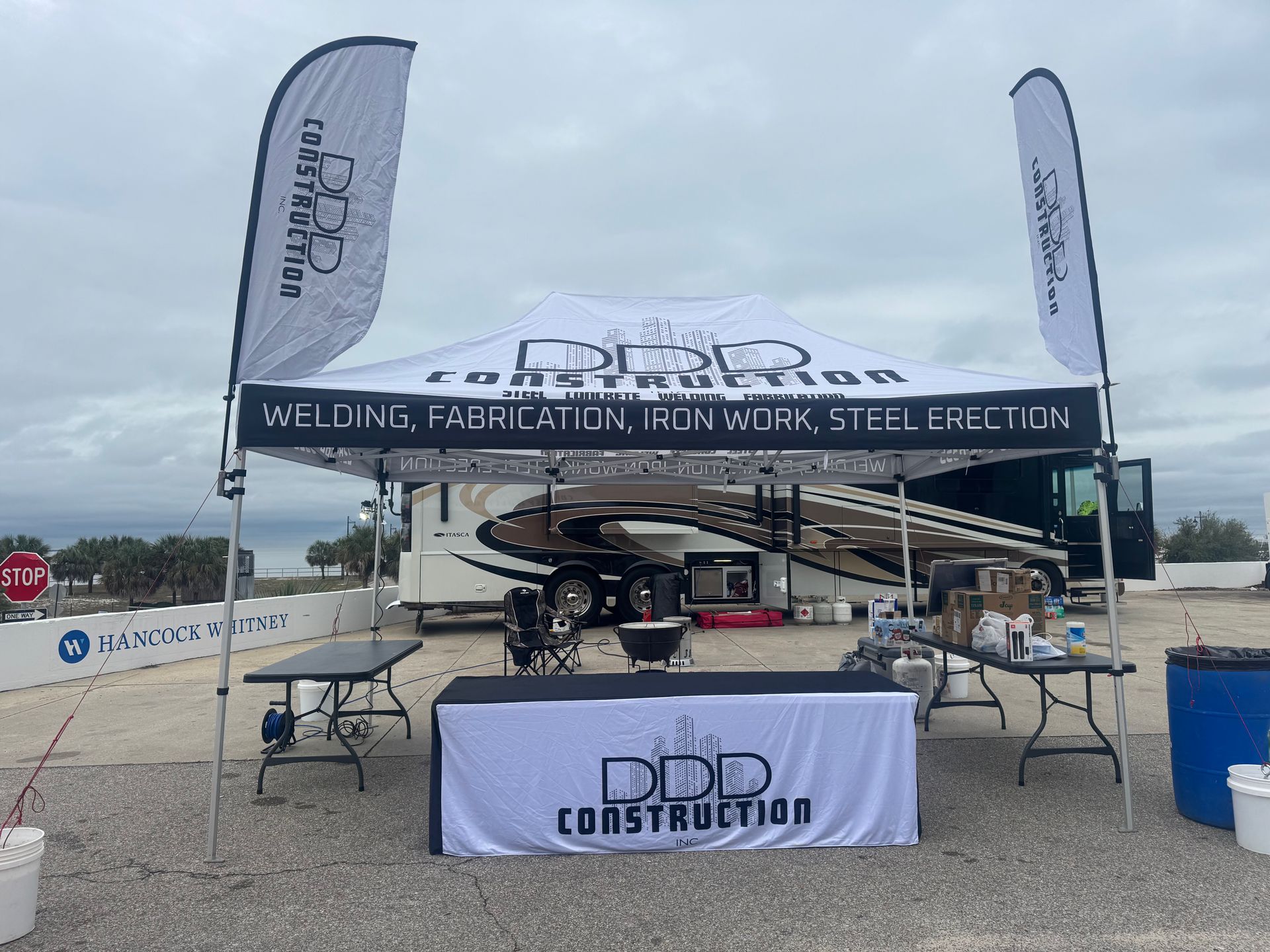 A forklift inside a building with another yellow vehicle visible in the background.