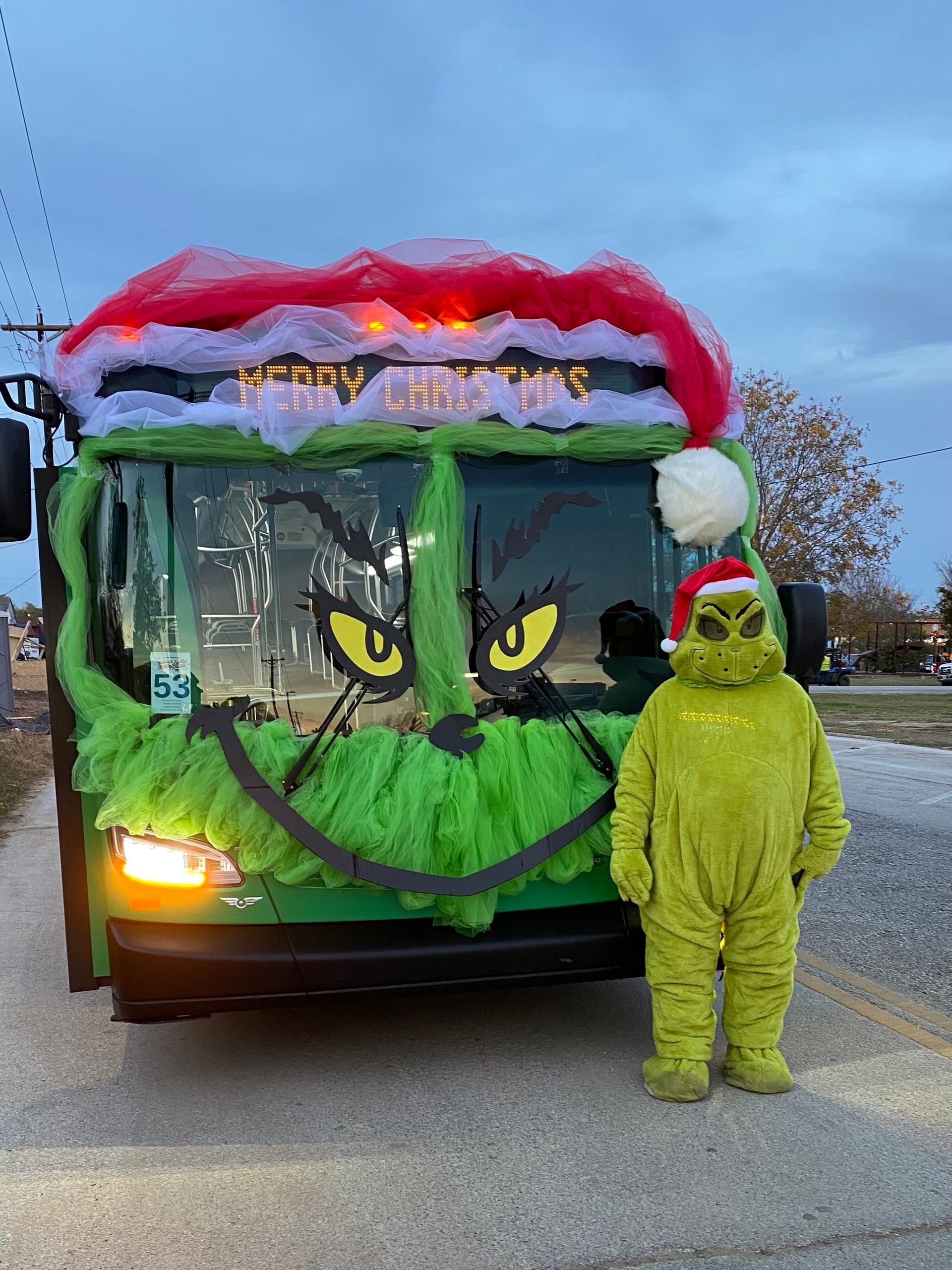 Brazos Transit District Bus with Santa Hat and Grinch Mascot