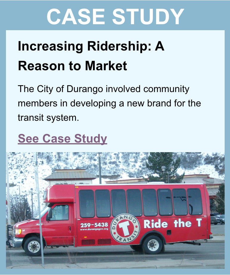 Red transit bus with Ride the T logo