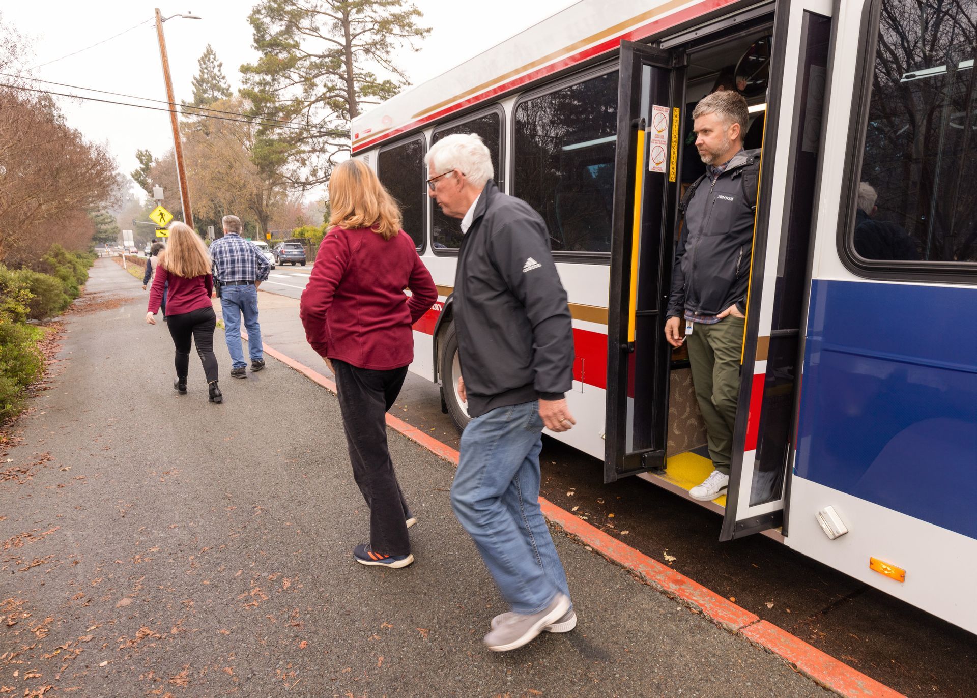 People leaving a bus