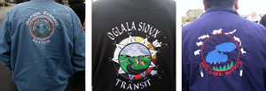 Backs of 3 Tribal transit jackets