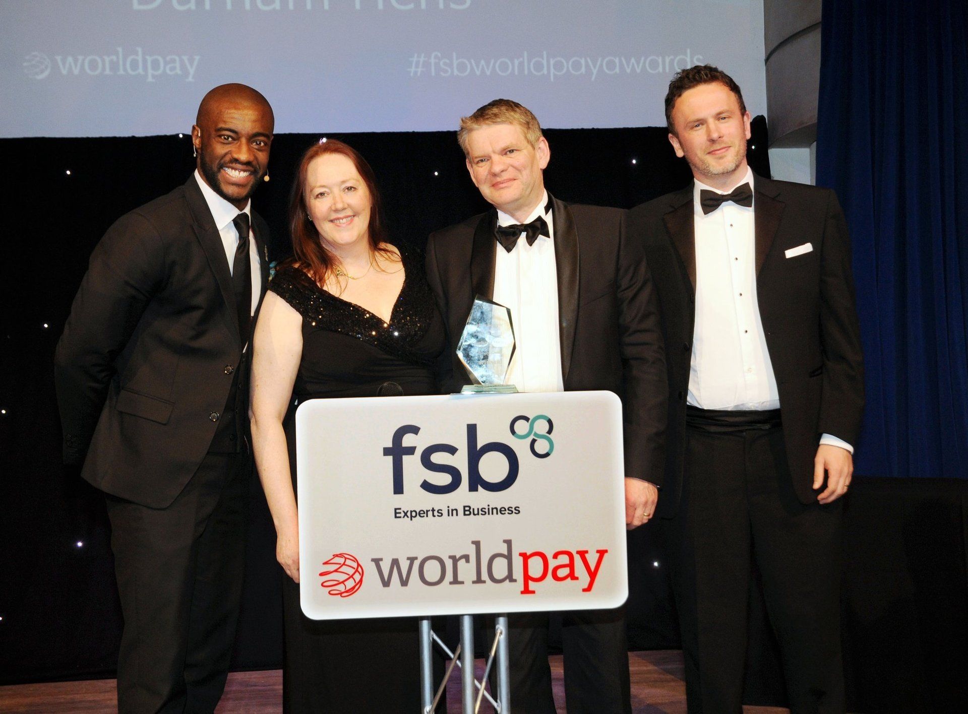 Margaret and Alec Manchester receiving the FSB UK Microbusiness of the Year award at the national finals in 2017.