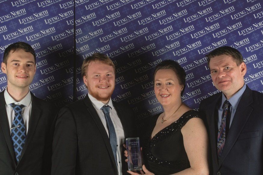 The Durham Hens team celebrating after winning the Living North Small Business of the Year Award in 2015, with Margaret, Alec, Stephen and Richard.
