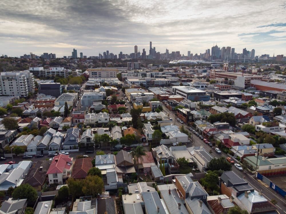 An Aerial View Of A Residential Area With A City Skyline In The Background — Economy Waste Group | Skip Bins Central Coast In Hamlyn Terrace, NSW
