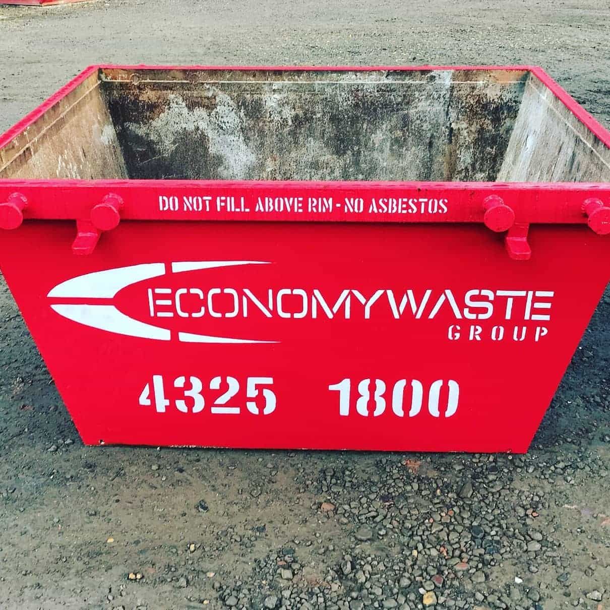 A Red Dumpster From The Economy Waste Group — Economy Waste Group | Skip Bins Central Coast In Woy Woy, NSW