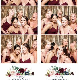 A group of women are posing for a picture in a photo booth.
