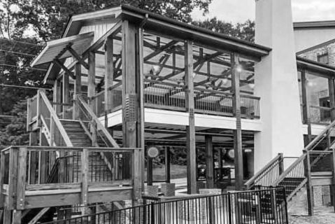 A black and white photo of a building under construction.