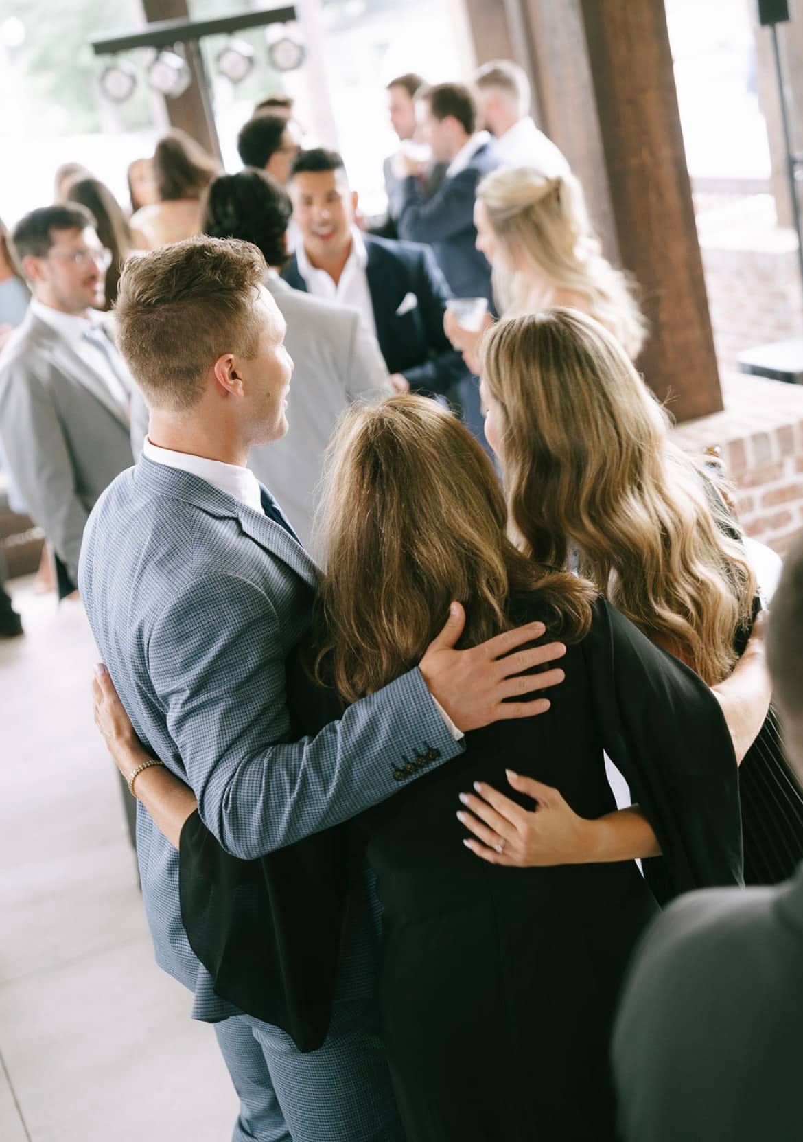 Cocktail hour candid photo at The Cowan Historic Mill in Metro-Atlanta. 
