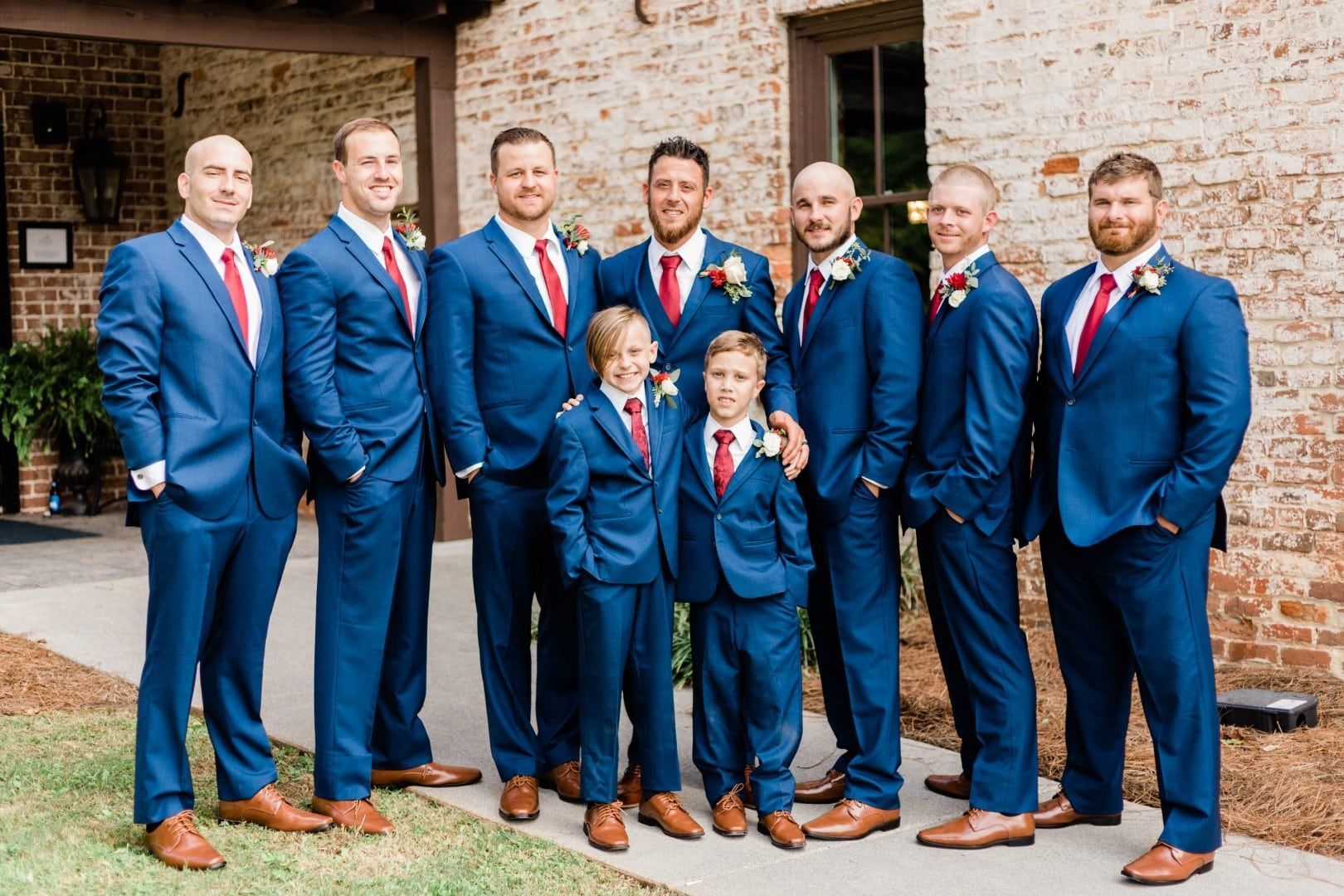 Groomsmen party stand outside of The Cowan Historic Mill in Wedding Photography. Metro-Atlanta venue in Acworth, GA. 