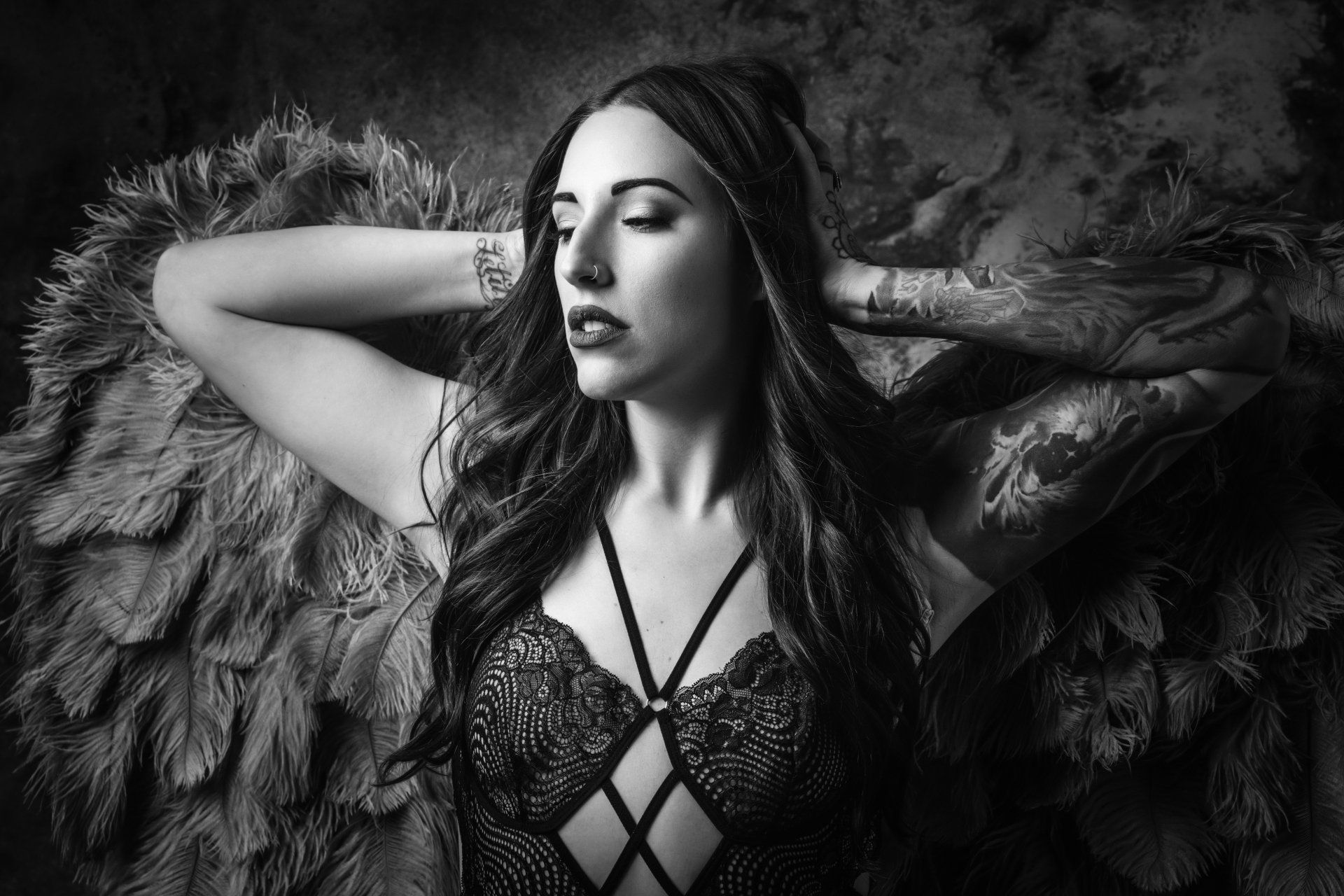 sexy portrait of woman wearing angel wings