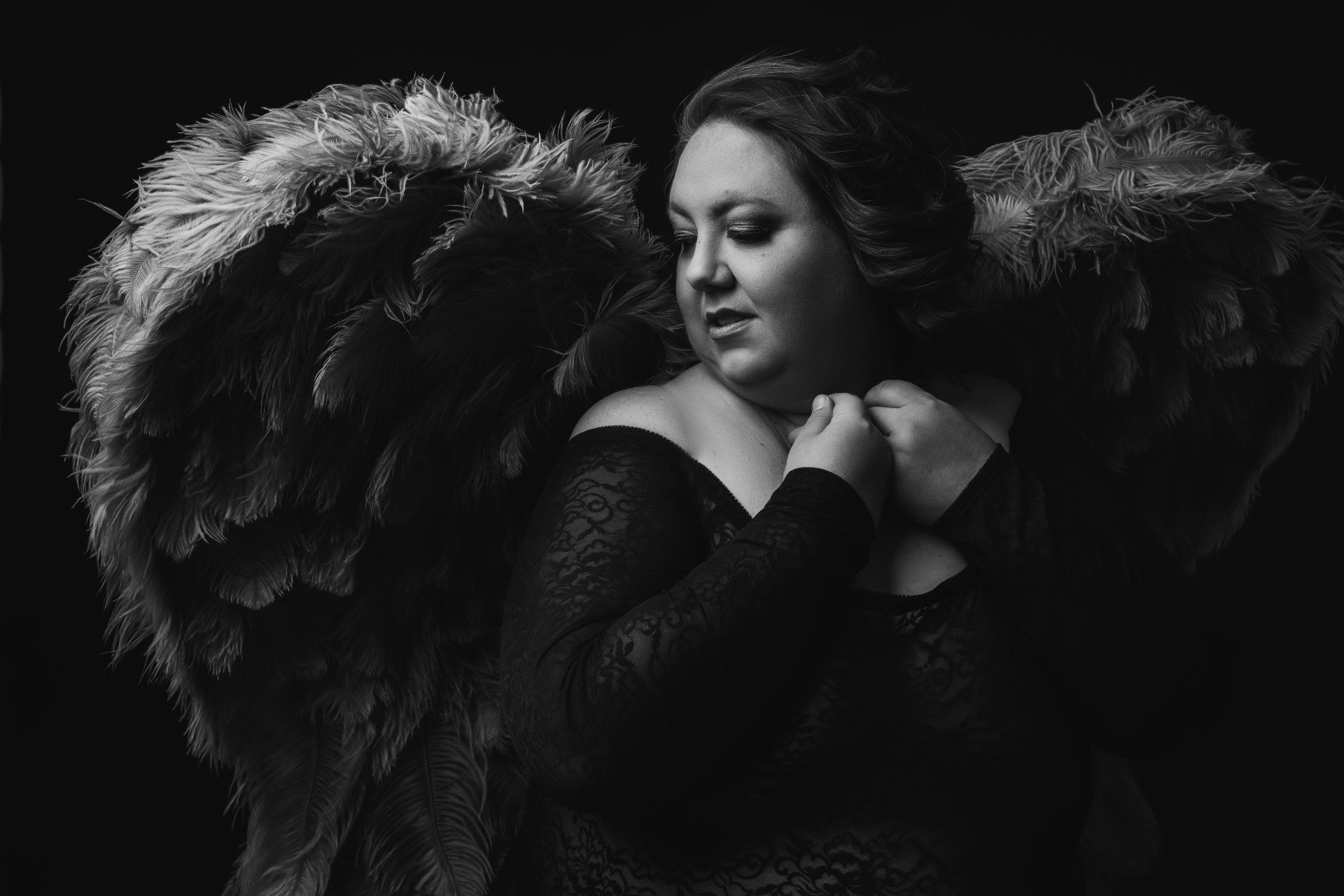 woman in angel wings