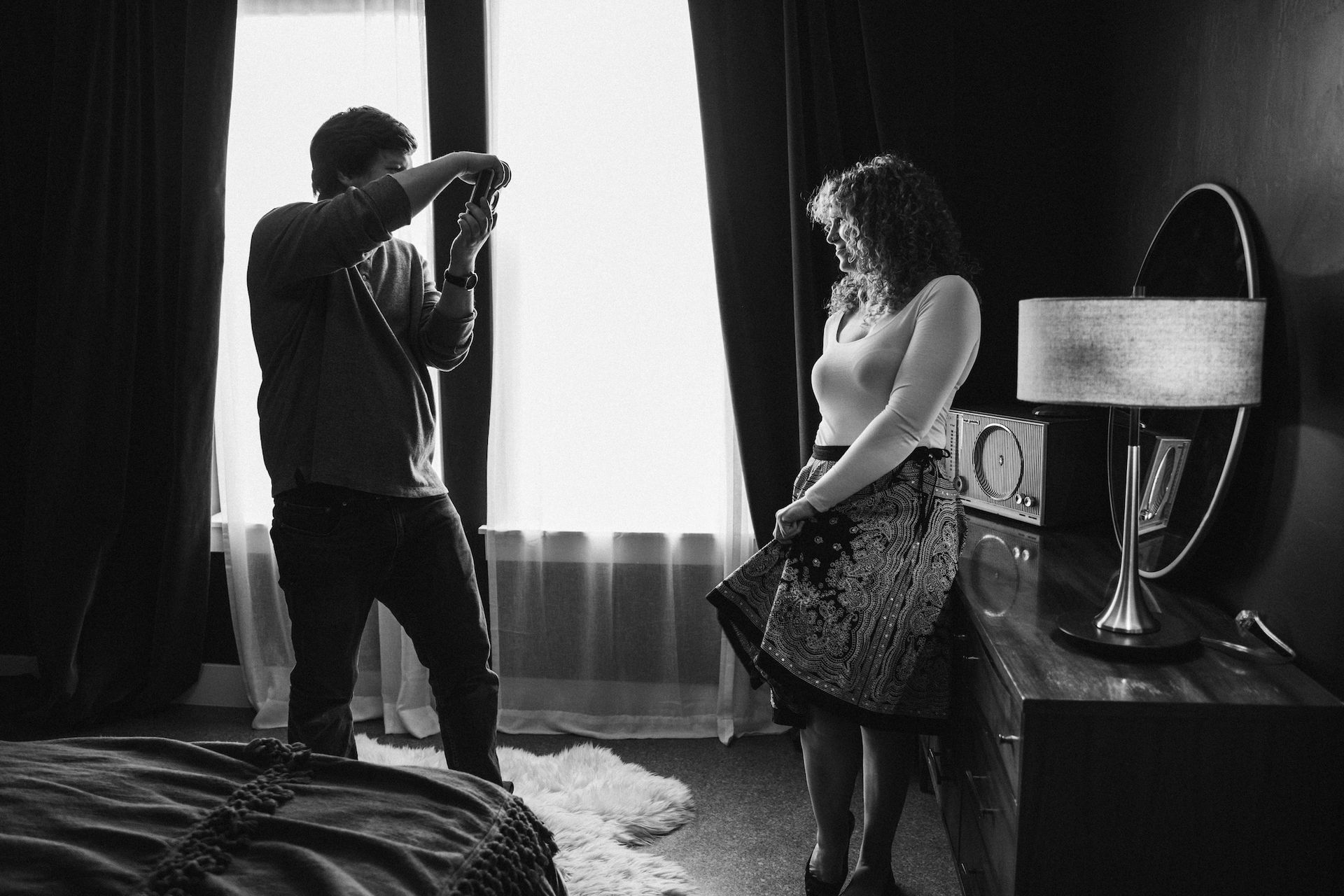 boudoir photographer in Utah taking photo of client