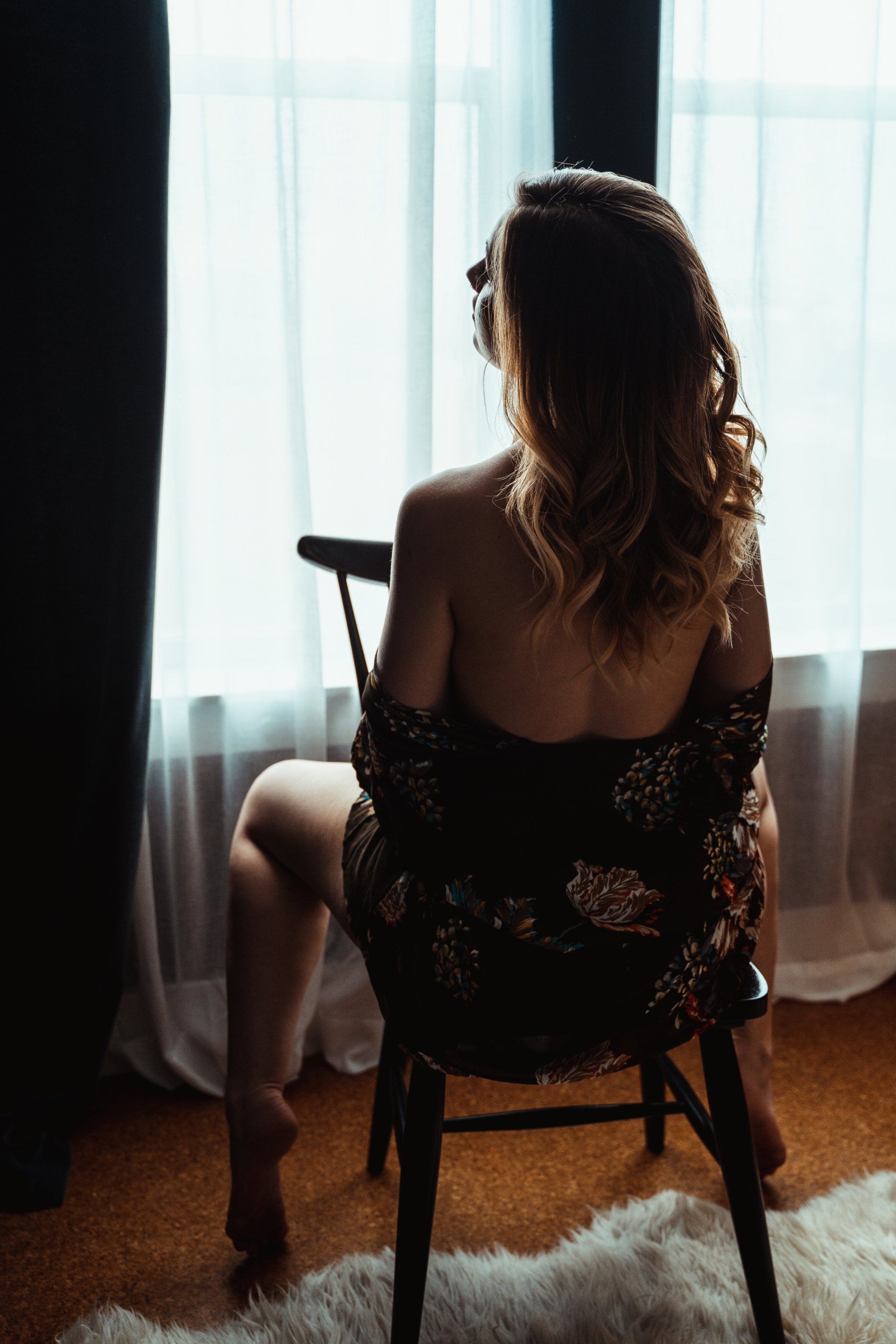 boudoir photography Utah woman sitting on chair