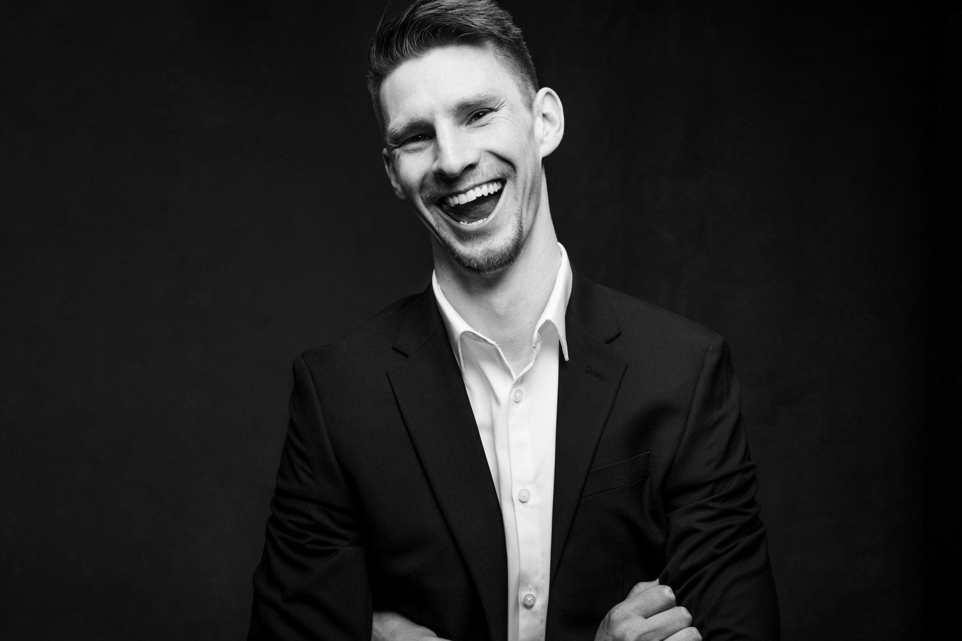 black and white portrait man smiling