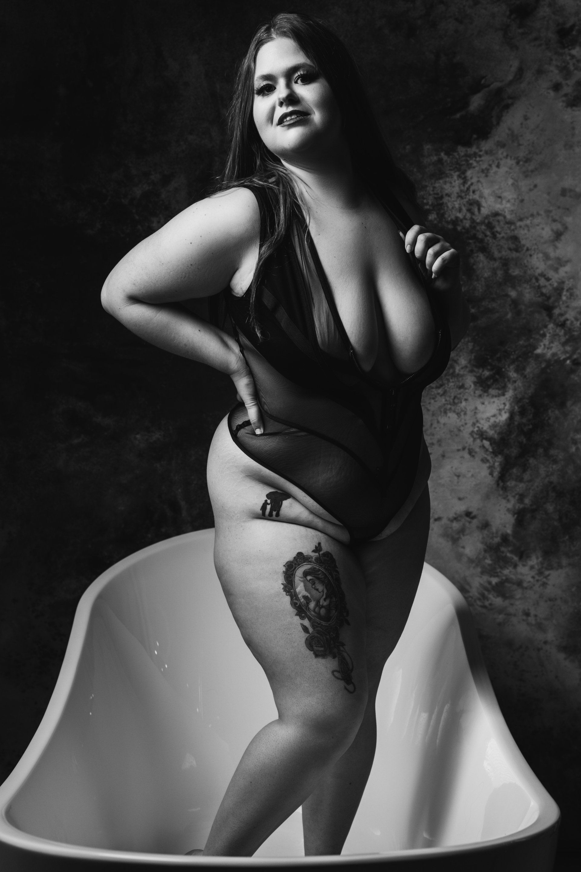 sexy photo standing in bathtub