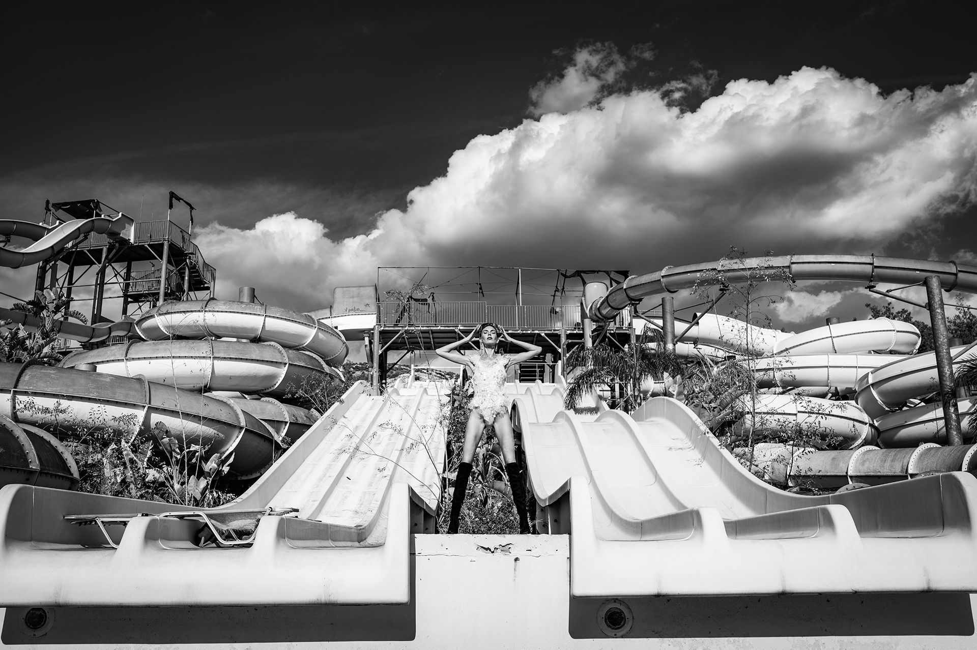 woman standing on the water slide