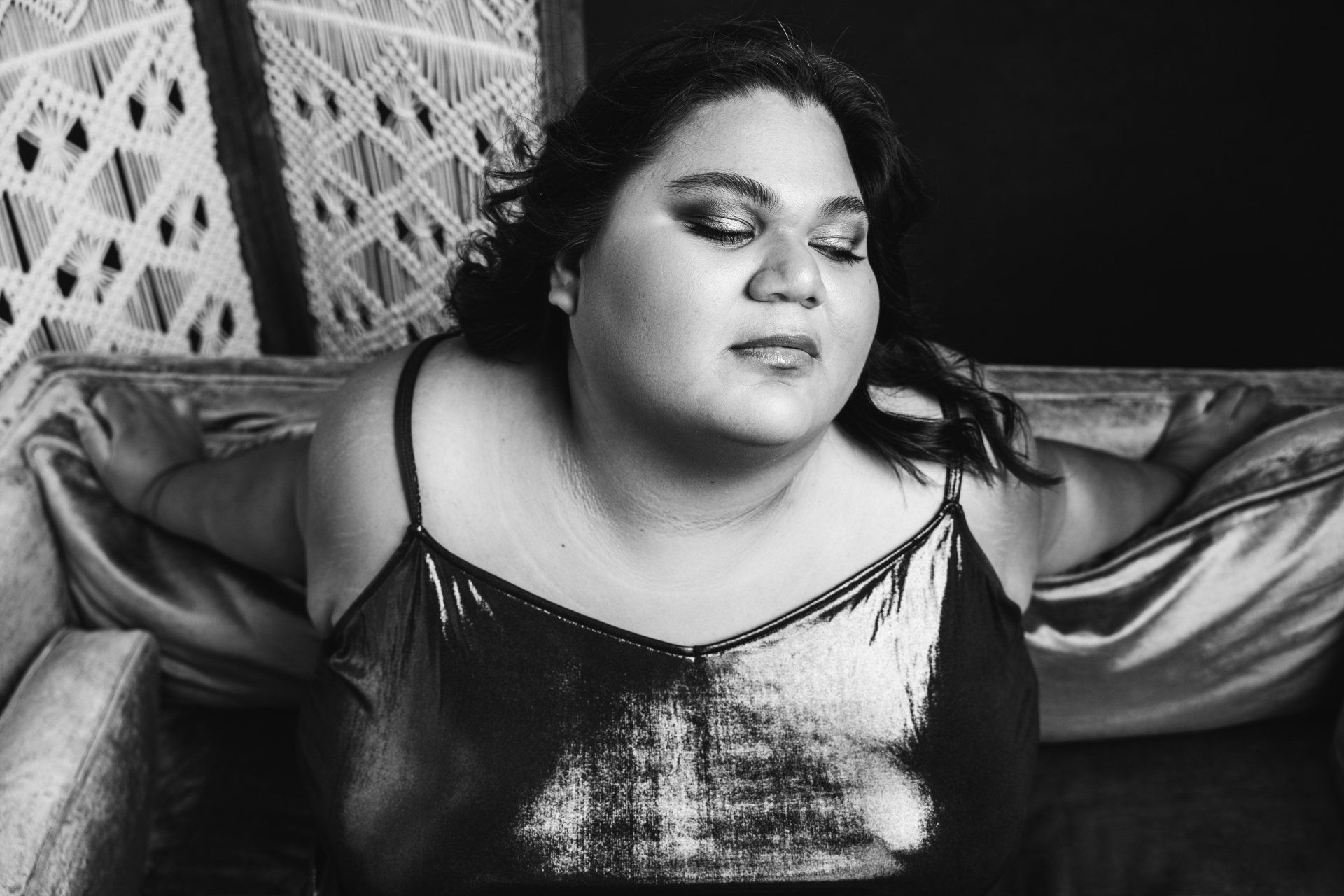 woman reclining on a couch
