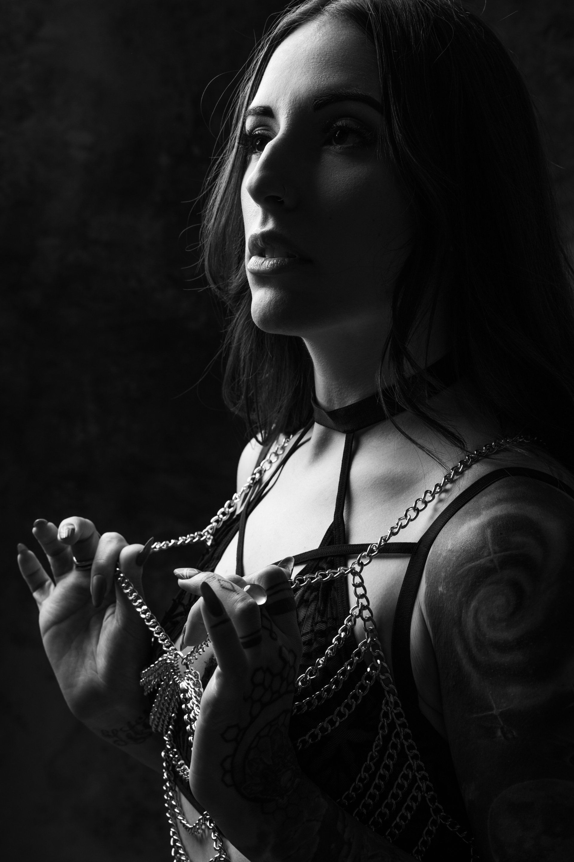 sexy black and white portrait of woman wearing body jewelry