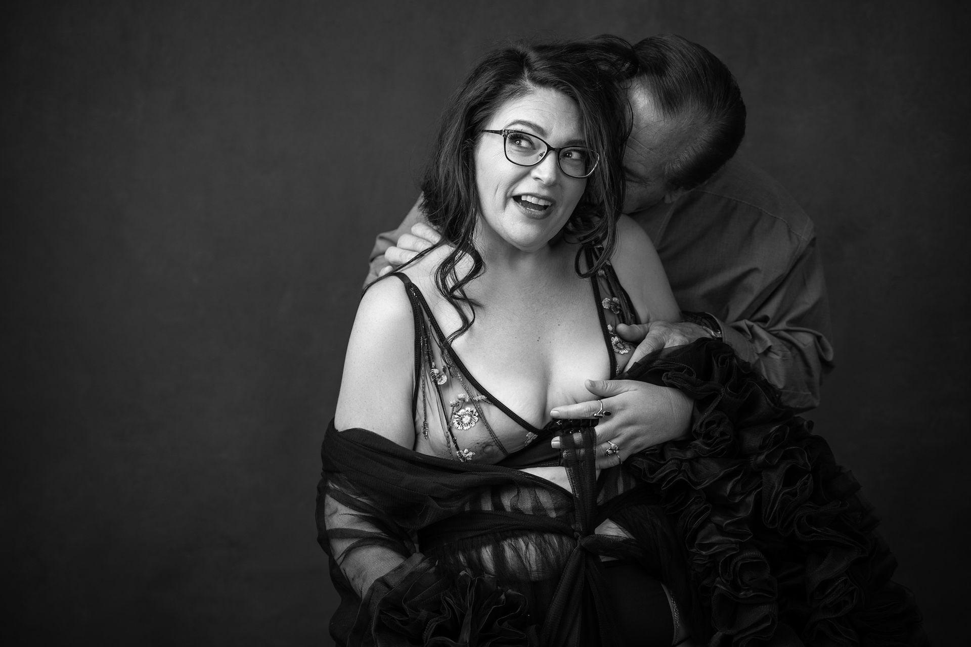 couples boudoir shoot with glasses
