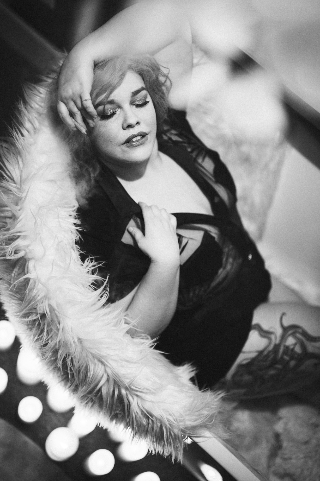 plus size woman lying in a fluppy sofa bed