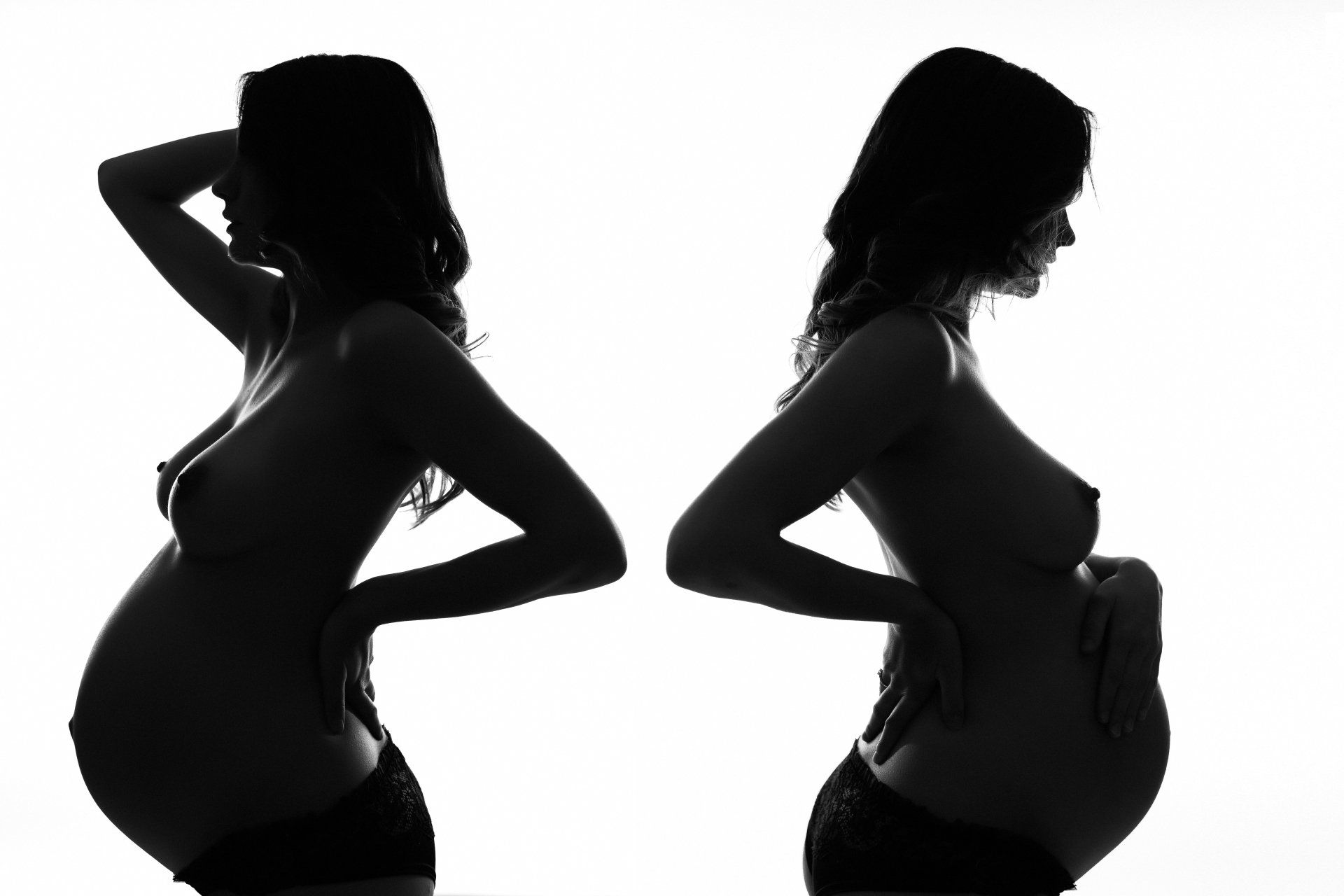 A pregnant woman poses for Boudoir photography