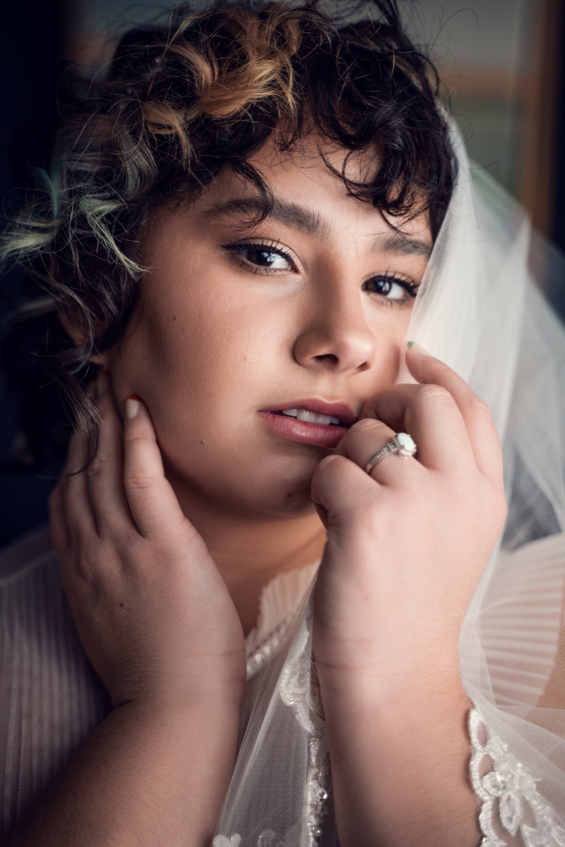 photo of woman wearing  white bridal gown 