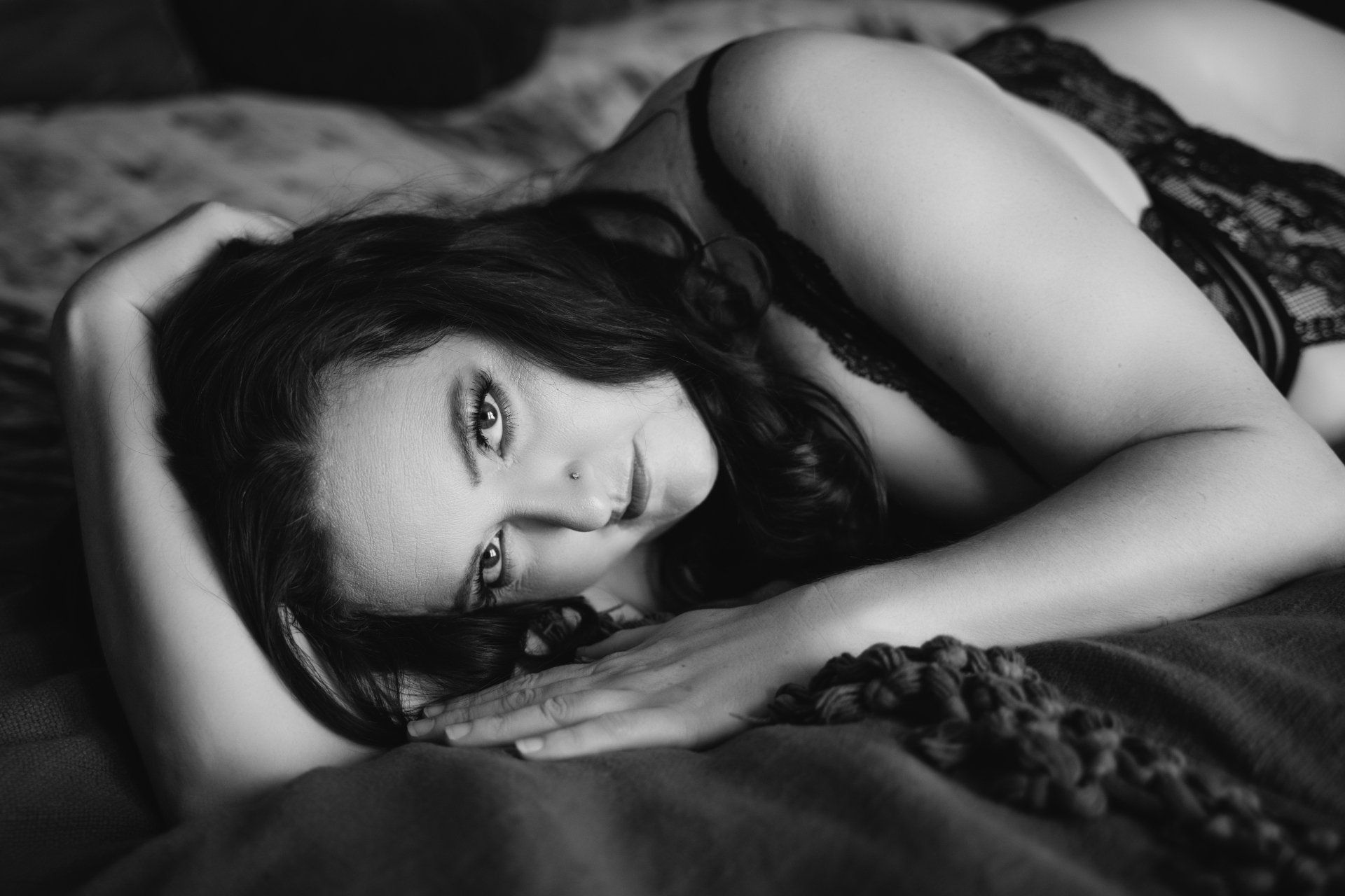 woman lying on bed