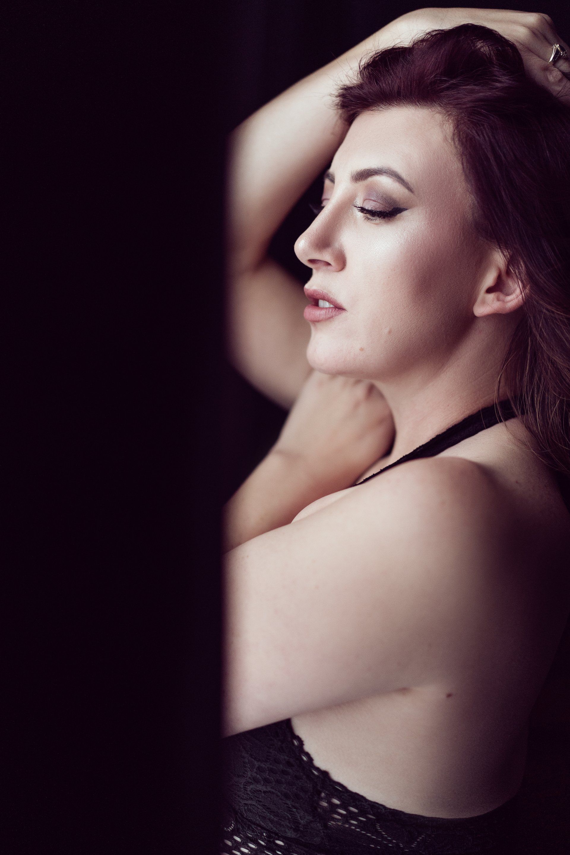 woman looking out of window