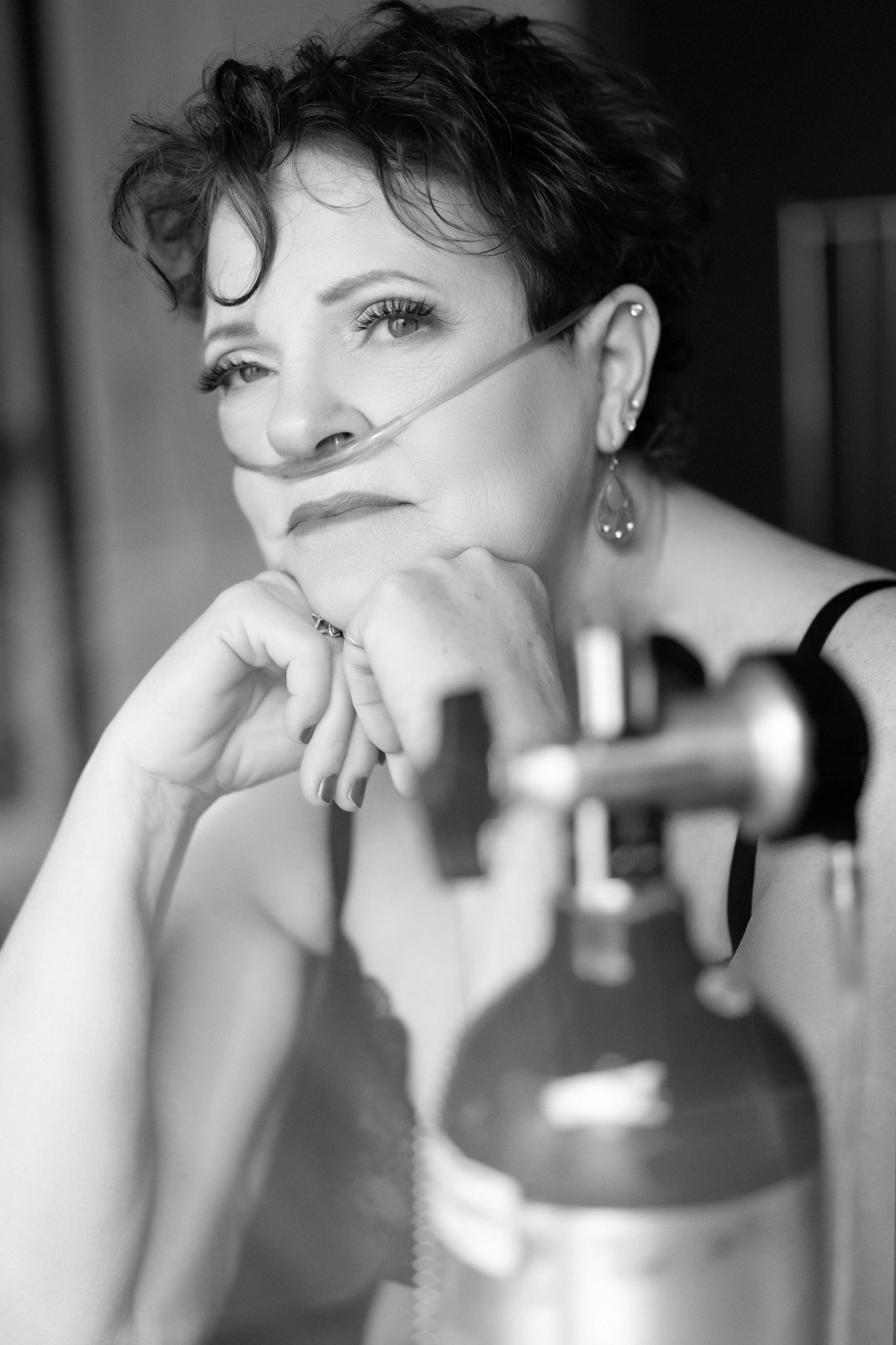 boudoir portrait of a woman with an oxygen tank