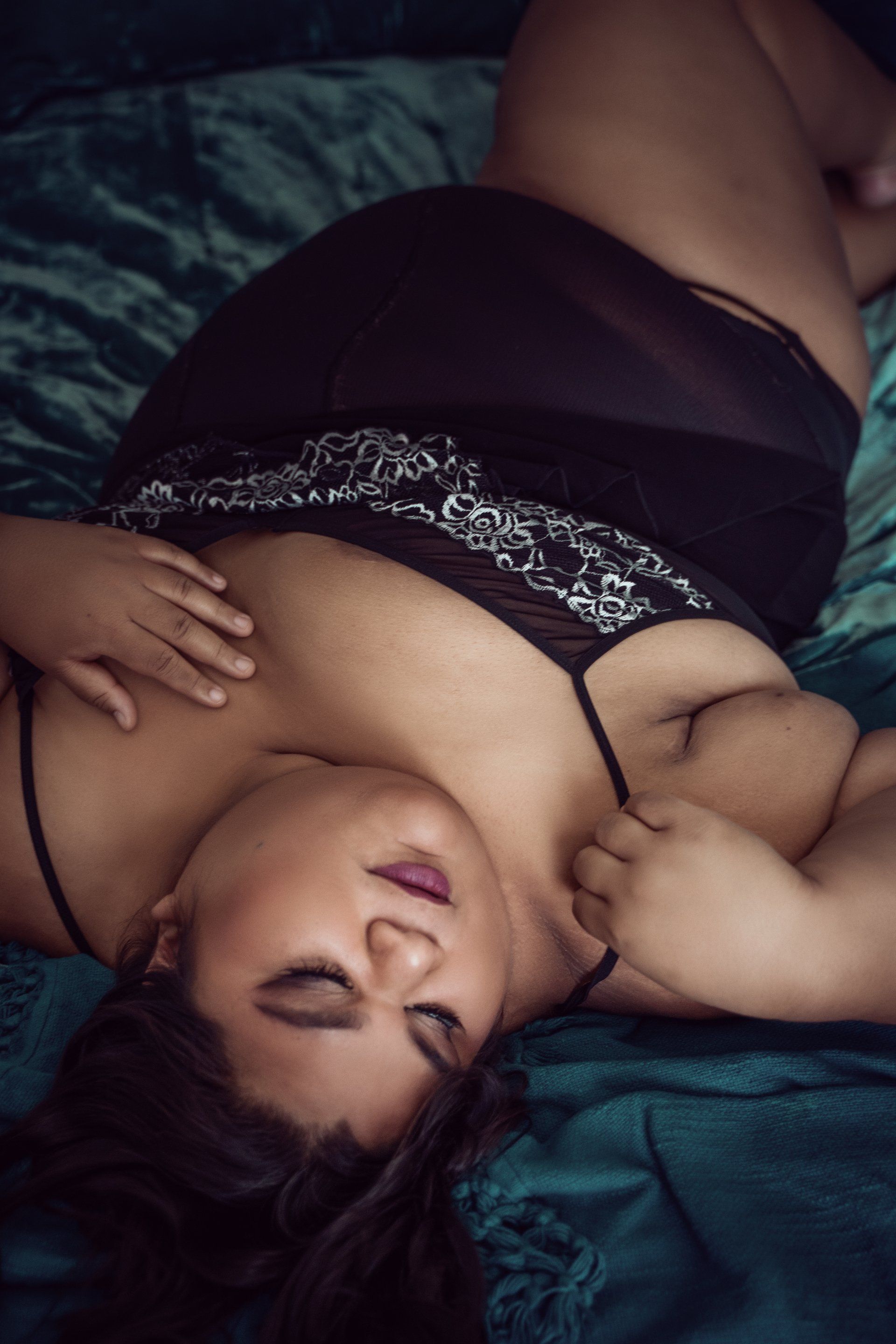a girl lying in bed with her close eyes