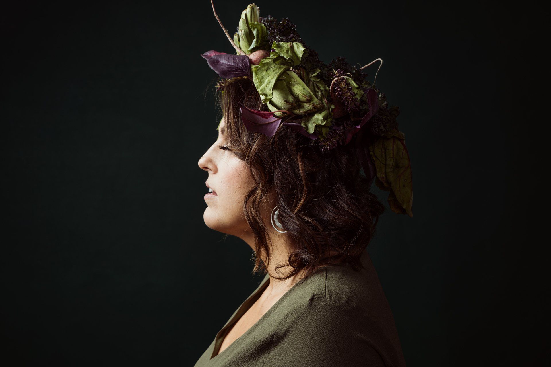 vegan woman wearing vegetable crown