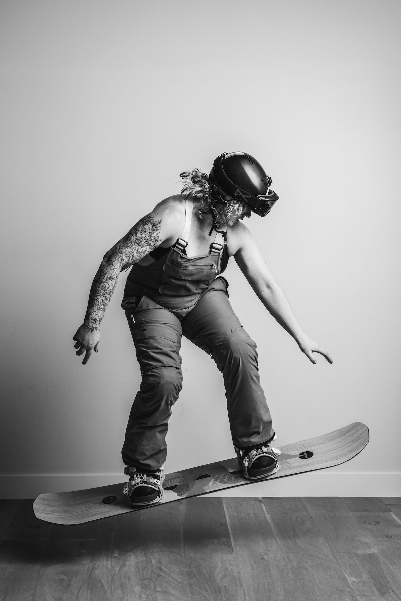 trans woman on snowboard