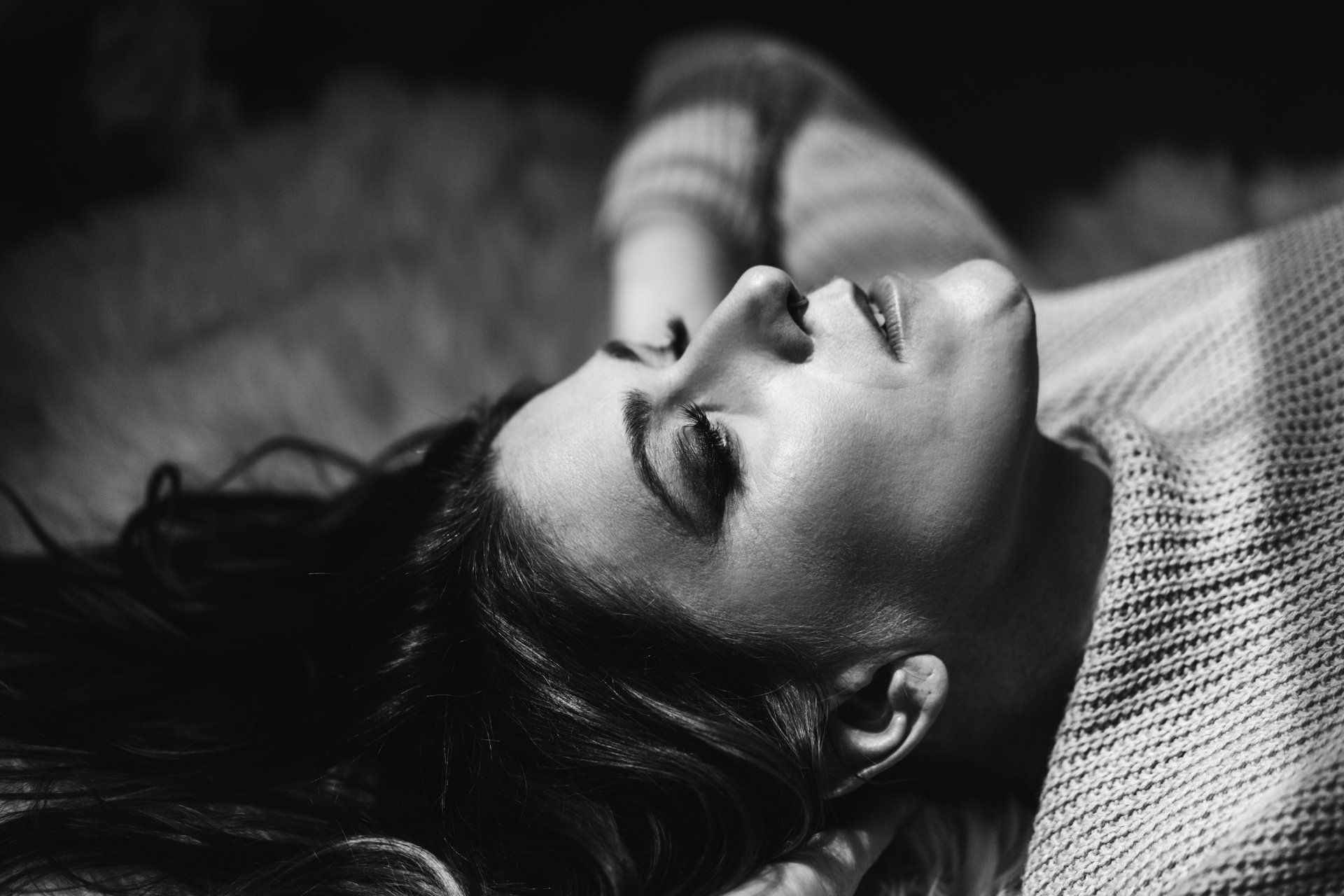 portrait of a woman laying on the floor
