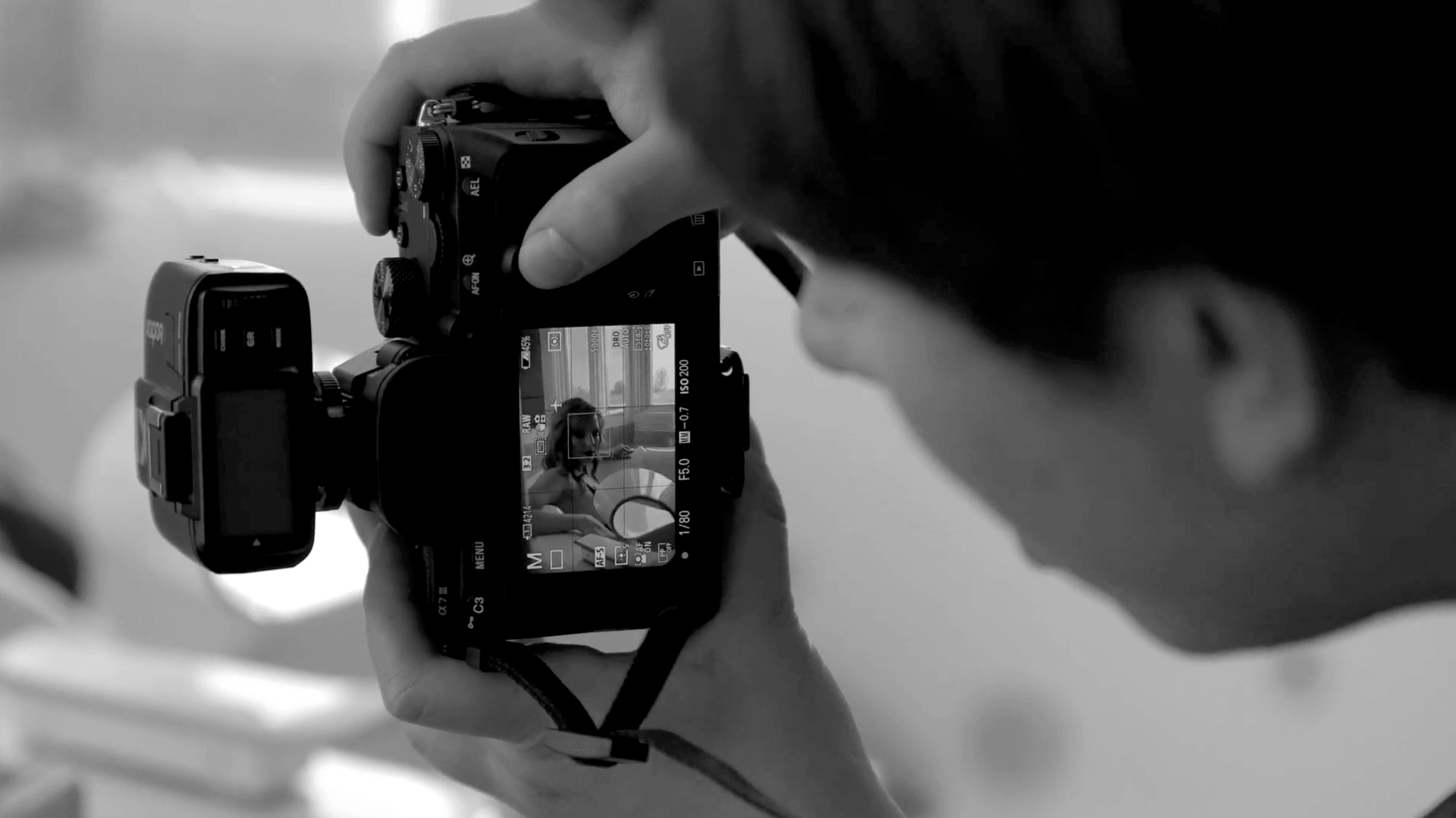 man taking a photograph