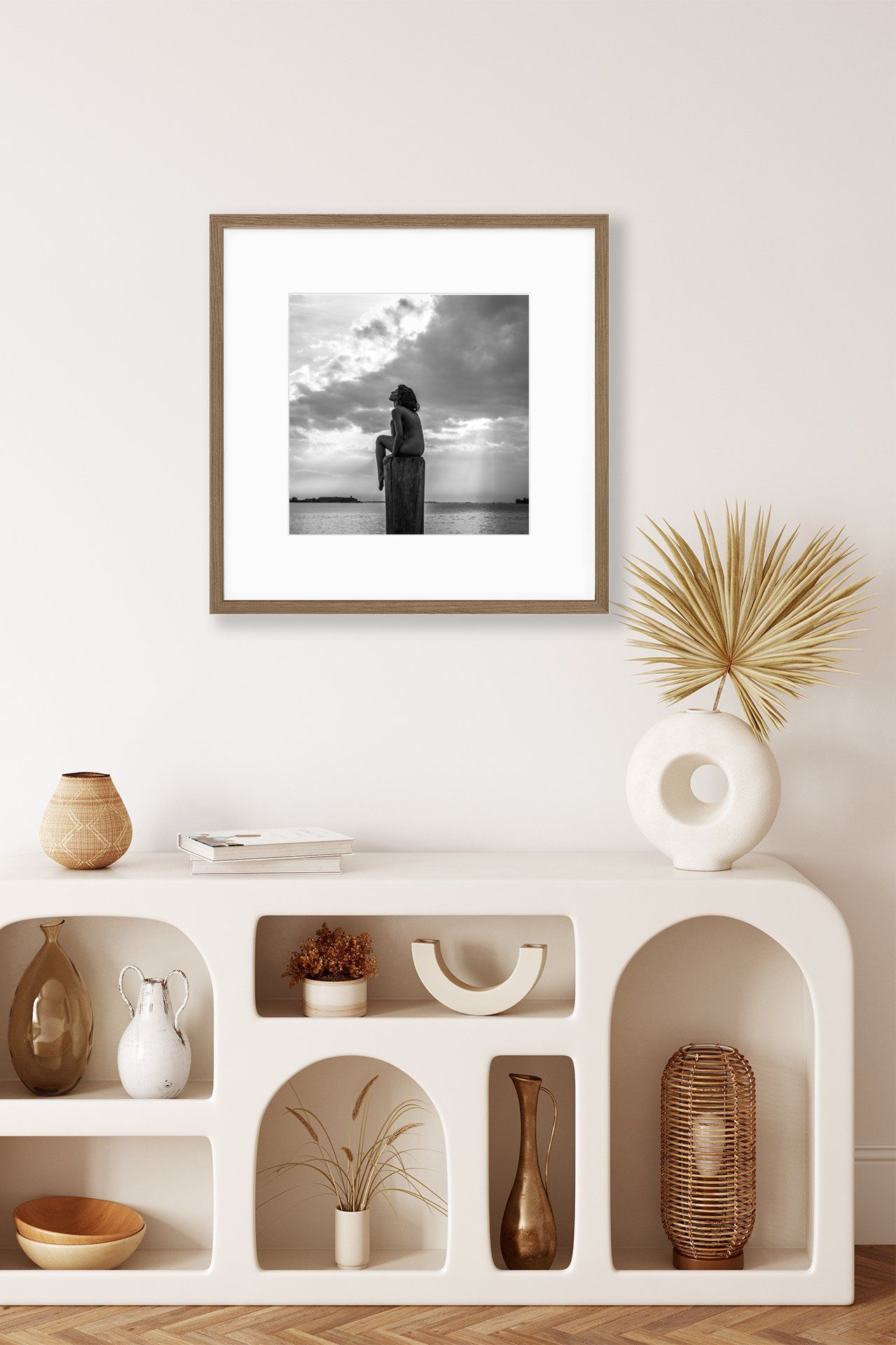 photo of a woman in a portrait in the minimalist corner with dried leaves